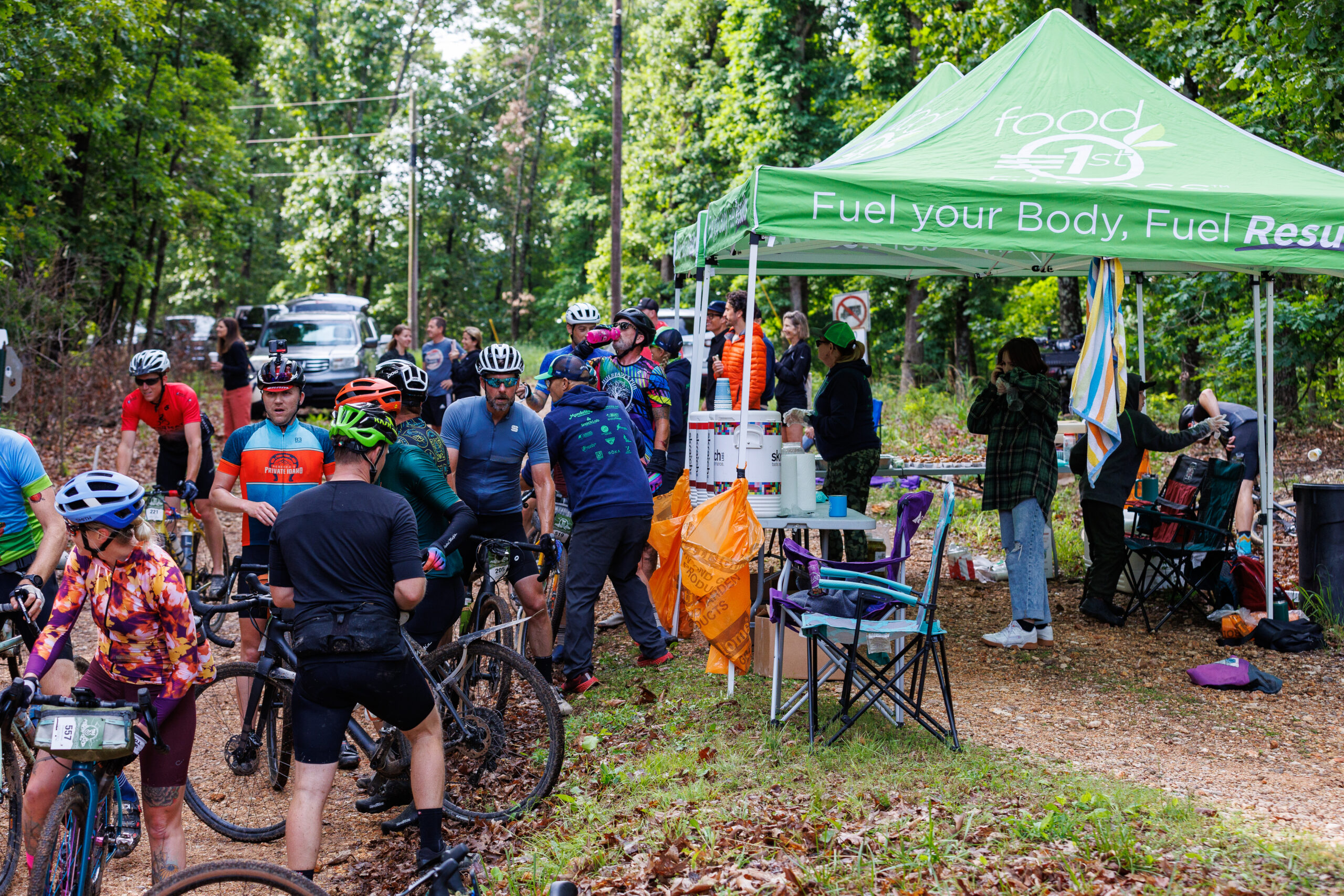 Riders at a team check point stop